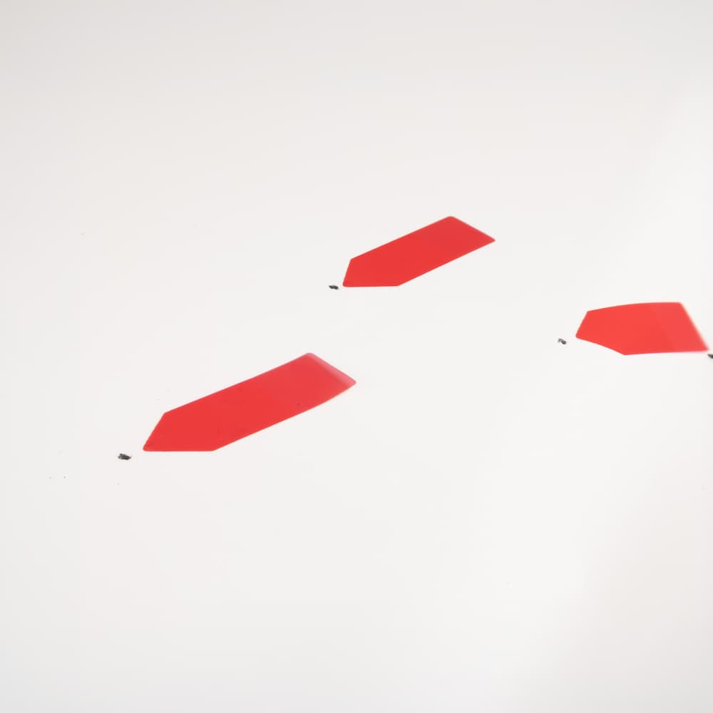 Car hood with paint chip before Chip-Fixx repair