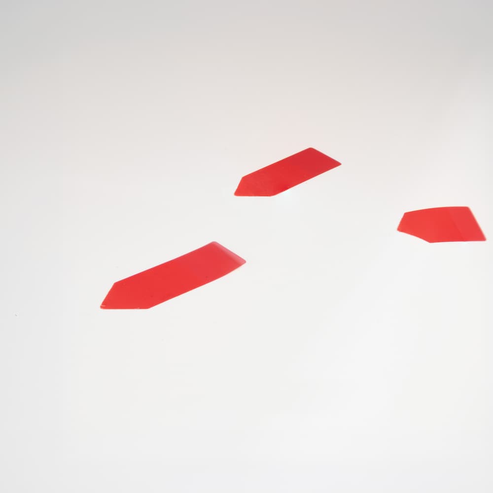 Car hood with paint chip repaired using Chip-Fixx touch-up paint